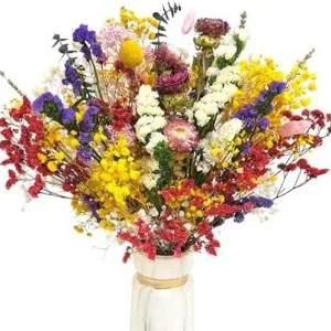 Colorful mixed dried flower bouquet in vase for home decor and wedding floral arrangement