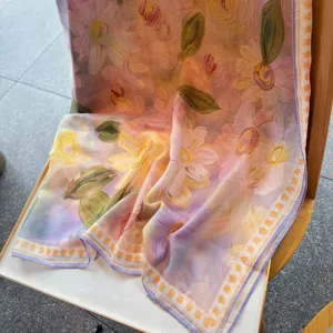 French vintage floral silk cotton square scarf detail showing delicate pastel flower print and soft fabric drape.