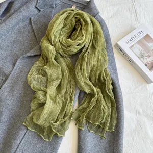 Olive green slub nylon scarf detailed view, lightweight breathable neck accessory for autumn.