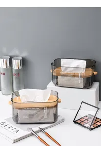 Nordic minimalist lifting tissue box detail showing transparent grey body and wooden lid.