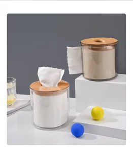 Clear cylindrical tissue box with bamboo wooden lid for living room home desktop paper storage.