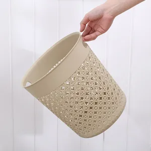 Plastic hollow trash can, beige open waste basket for bathroom, kitchen, and living room.