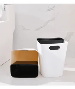 Plastic waste basket detail showing inner pressing ring and dual-color design for home use.