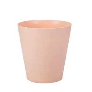 Grand corbeille a papier ronde en plastique, bac à ordures rose pour cuisine et bureau.