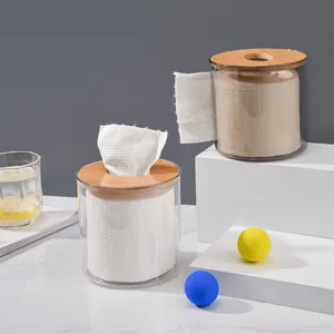 Clear round tissue box with wooden lid, modern desktop roll paper storage container.