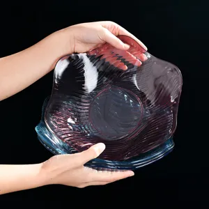 Moderne kreativer Wellen-Fruchteller, transparente Plastik-Bonbonschale für Wohnzimmer.