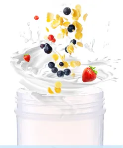 Detailed view of clear sports shaker cup with dynamic milk splash, cereal and fresh fruit.
