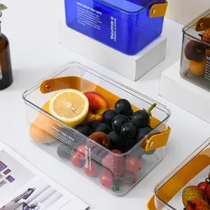 Cesto portaoggetti trasparente in plastica con manico per frutta, snack e organizzazione.