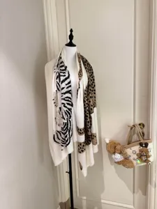 Vintage animal print scarf shawl for women, elegant lightweight summer fashion accessory detail.