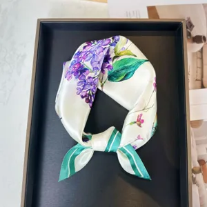 Elegant silk square scarf featuring vibrant purple lilac floral print and stylish green striped borders.