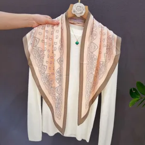 Pink paisley triangular silk scarf with brown border, elegant women's neckerchief for spring.