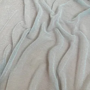 Detailed view of the elegant metallic pleated solid color women scarf and fabric texture.