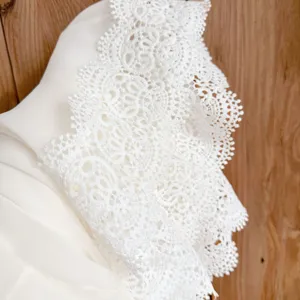 White chiffon lace trim detail closeup shot, perfect for elegant women summer shawls.