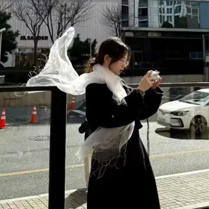 White lightweight mesh tassel scarf for women, elegant spring and summer fashion accessory.