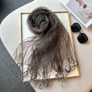 Sheer organza tassel scarf detail view, lightweight feather texture for spring summer styling.
