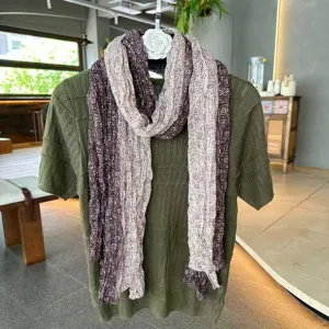 Women's artistic retro paisley crinkled scarf and matching green short sleeve knit top set.