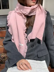 Pink knitted winter scarf with delicate lace ruffle trim, stylish warm neck wrap for women.