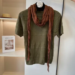 Retro green short sleeve knit top with brown crinkled scarf shawl, elegant vintage clothing.