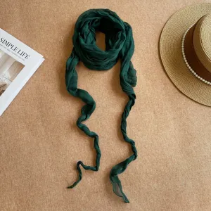 Dark green wrinkled scarf detail, lightweight textured fabric, elegant retro neck scarf and shawl.