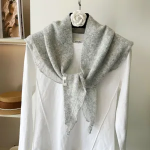 Cozy knit triangle scarf shawl, soft winter shoulder wrap for women, stylish neck warmer.
