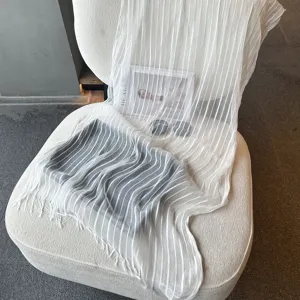 Lightweight sheer striped scarf for women summer elegant long tassel shawl white fabric detail.