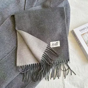 Grey double-sided imitation cashmere scarf with stylish fringe, warm winter neck wrap.