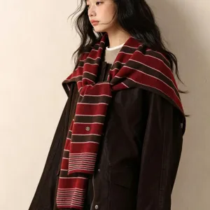Stylish striped wool shawl scarf for women, cozy winter knitted wrap outerwear piece.