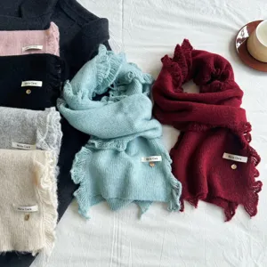 Cozy thick knit winter scarf with sweet lace edge and elegant pendant, warm and stylish.