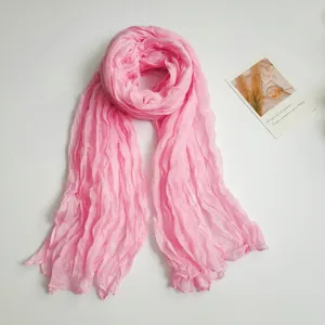Pink crinkled cotton linen scarf for women, lightweight spring autumn shawl wrap style.