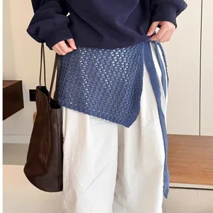 Korean style hollow knit wrap skirt waist accessory detail showing texture and chic layering design.