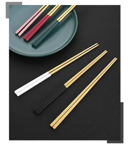 Modern stainless steel square chopsticks with chic colored handles for stylish home dining and kitchen use.