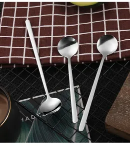 Stainless steel long handle round spoons, ideal for coffee, dessert, and honey mixing.
