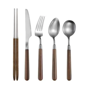 Stainless steel walnut handle flatware set including chopsticks knife fork and spoons for daily dining
