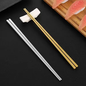 Stainless steel square chopsticks set with chopstick rest, modern kitchen tableware for home dining.