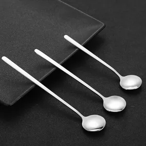 Stainless steel long handle round spoons for coffee, dessert, and honey stirring use.