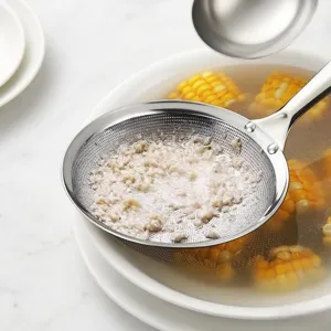 Stainless steel fine mesh skimmer spoon for hot pot, soup fat skimming, and kitchen food filtering.
