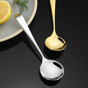 Premium stainless steel round spoon set with silver and gold finish for daily dining table use.