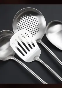 Detailed view of 304 stainless steel kitchen utensil set including slotted turner and soup ladle.