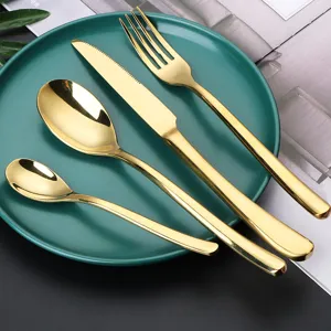 Gold stainless steel cutlery set, modern luxury flatware knife fork spoon for dining table.