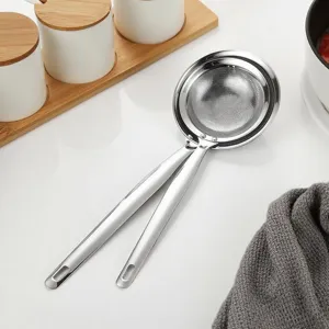 Stainless steel kitchen skimmer spoon with fine mesh and long handle for hot pot and soup.