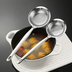 Stainless steel colander set for hot pot skimming and filtering in home kitchen.