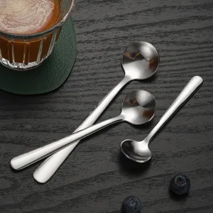 Stainless steel short handle round spoons set for coffee, dessert, and honey use.