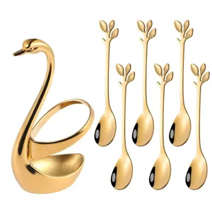 Luxury gold stainless steel swan holder set with six creative leaf dessert coffee spoons.