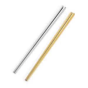 Stainless steel square chopsticks set, elegant silver and gold metal tableware for home dining.