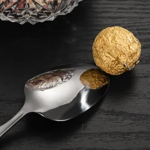 Premium stainless steel teaspoon with mirror polish finish, elegant western tableware set.