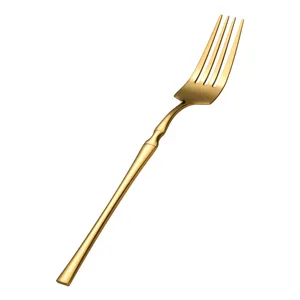 Gold stainless steel dinner fork with slim waist design, elegant European style for table.