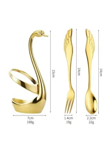 Gold swan cutlery set with stainless steel spoon fork and elegant swan holder stand.