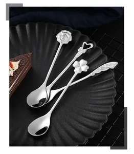 Stainless steel coffee spoon with creative rose heart and clover design for dessert mixing.
