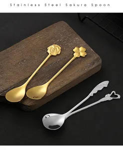 Stainless steel coffee stirring spoon set with creative rose clover heart designs for dessert.