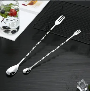 Stainless steel long handled bar spoon with double ended fork design, ideal for cocktail mixing.